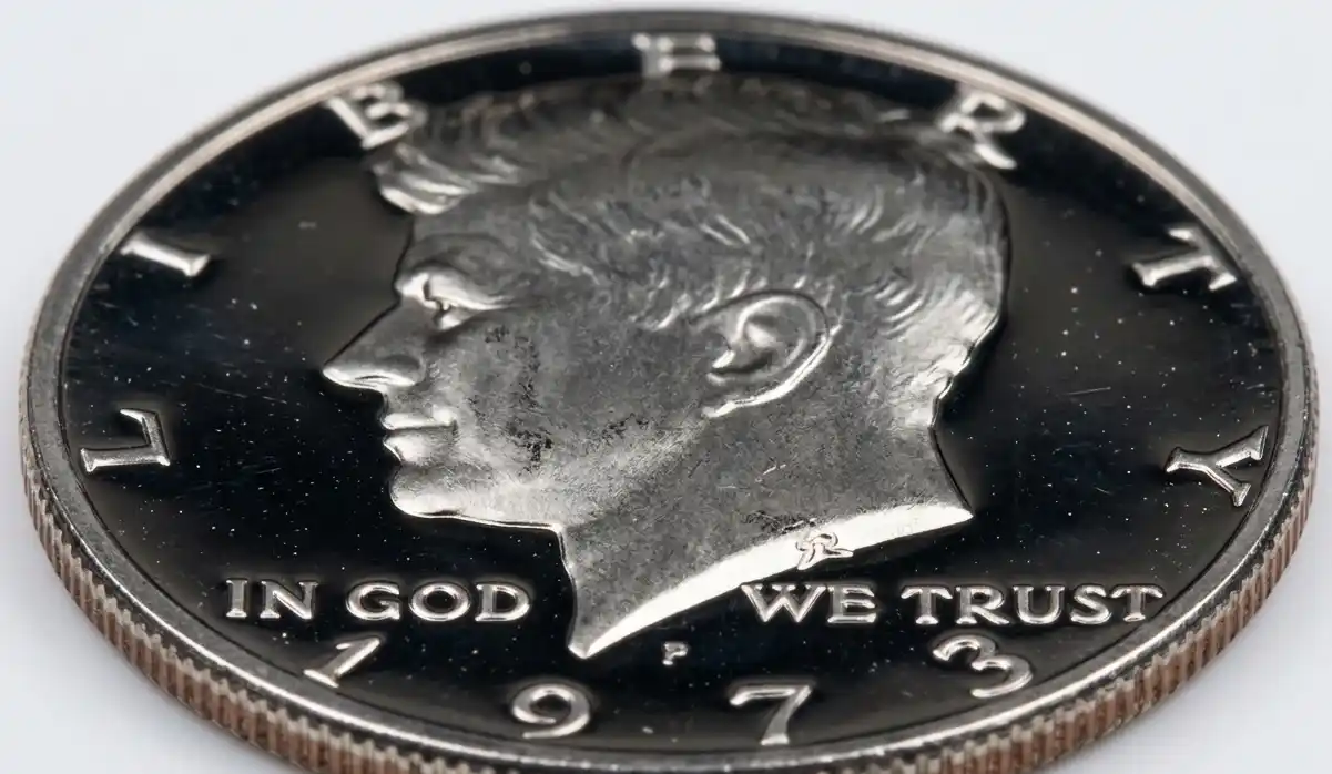  the obverse of the 1973 Kennedy Half Dollar